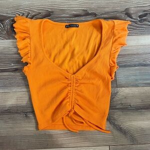 Orange ZARA ruffled tank top with frayed edges